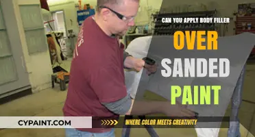 Smooth Finish: Applying Body Filler Over Sanded Paint