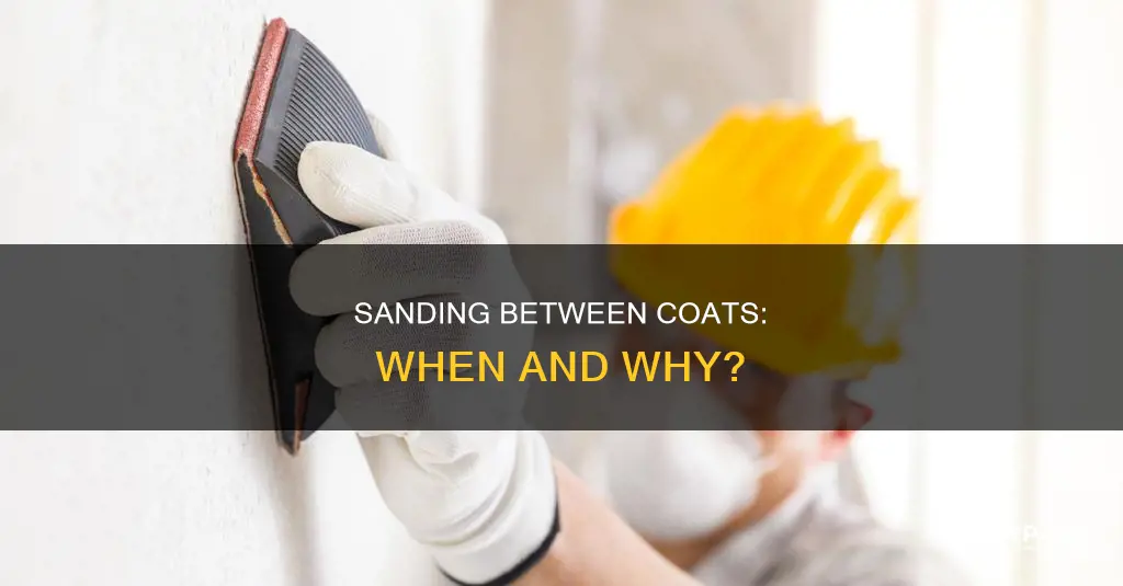do i sand after applying first coat of paint