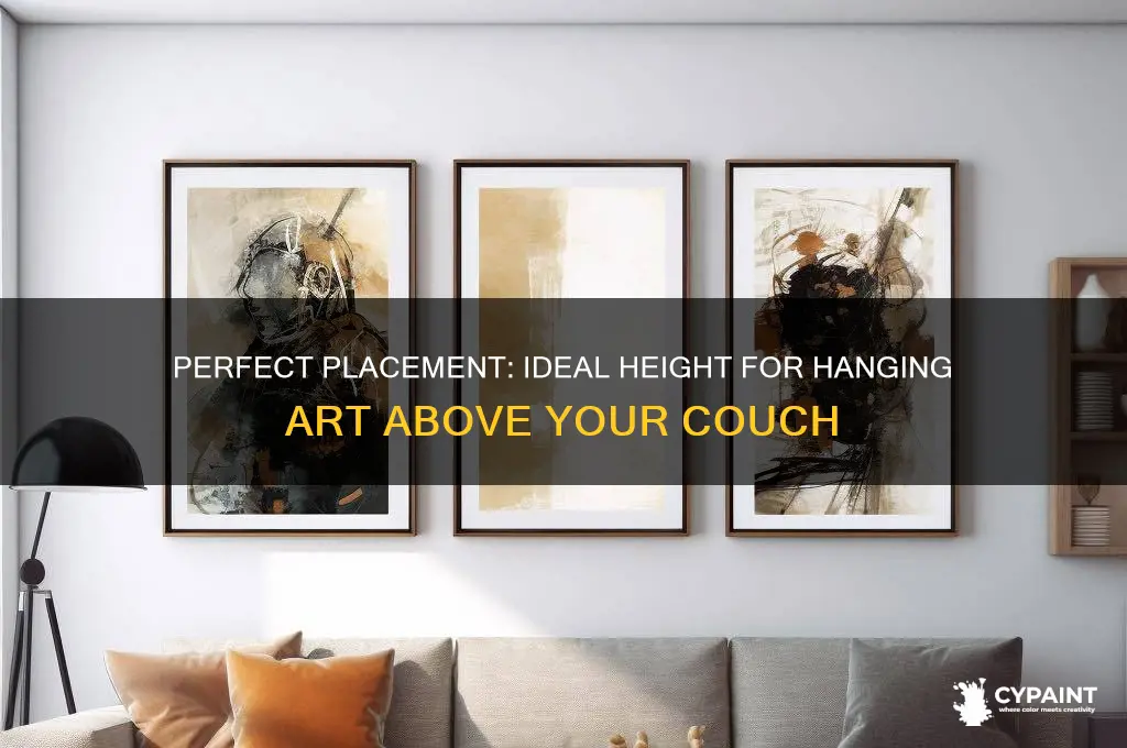 how high above a couch should a painting be hung