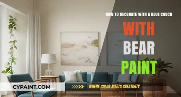 Styling a Blue Couch with Bold Bear-Themed Accent Walls