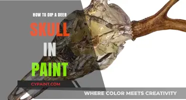 Creative Skull Art: Dipping Deer Skulls in Paint for Unique Decor