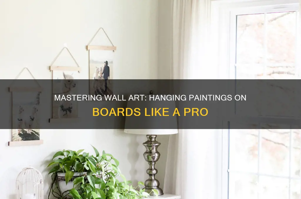 how to hang a painting on a board