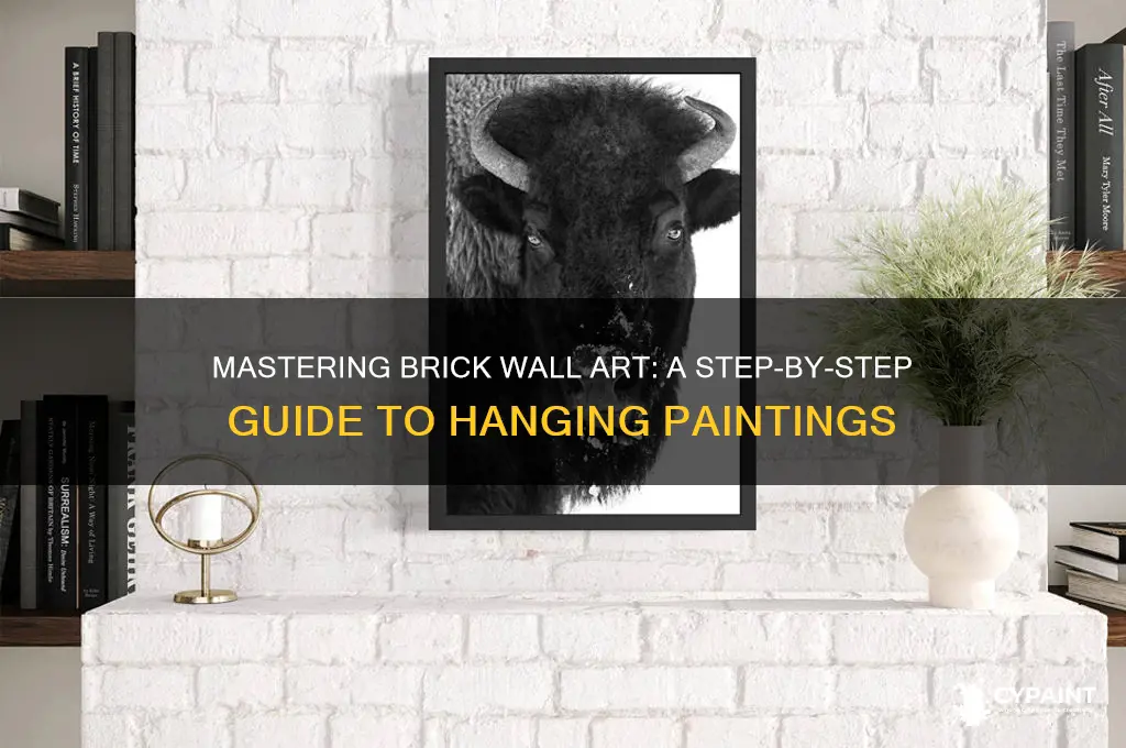 how to hang a painting on brick