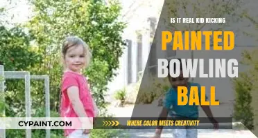 Kid Kicking Painted Bowling Ball: Fact or Fiction?