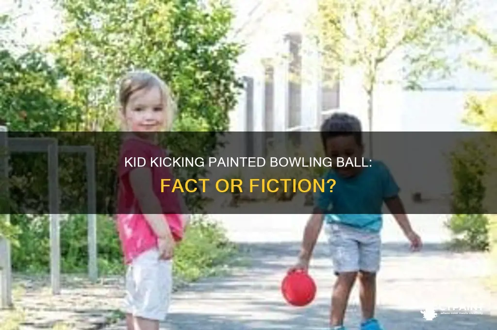 is it real kid kicking painted bowling ball
