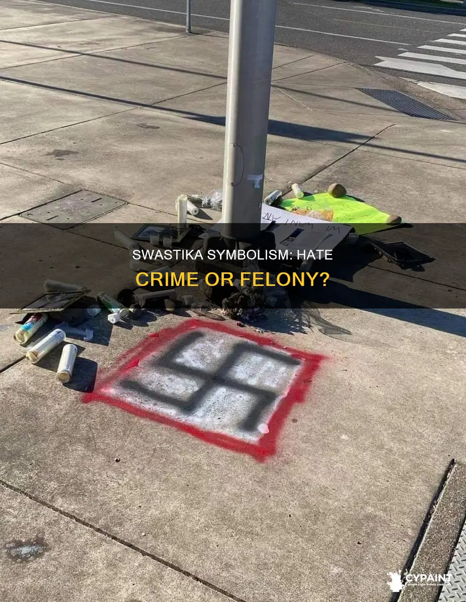 is painting a swastika a hate crime or felony