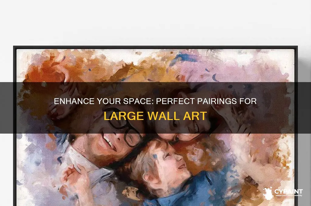 what to hang next to a large painting