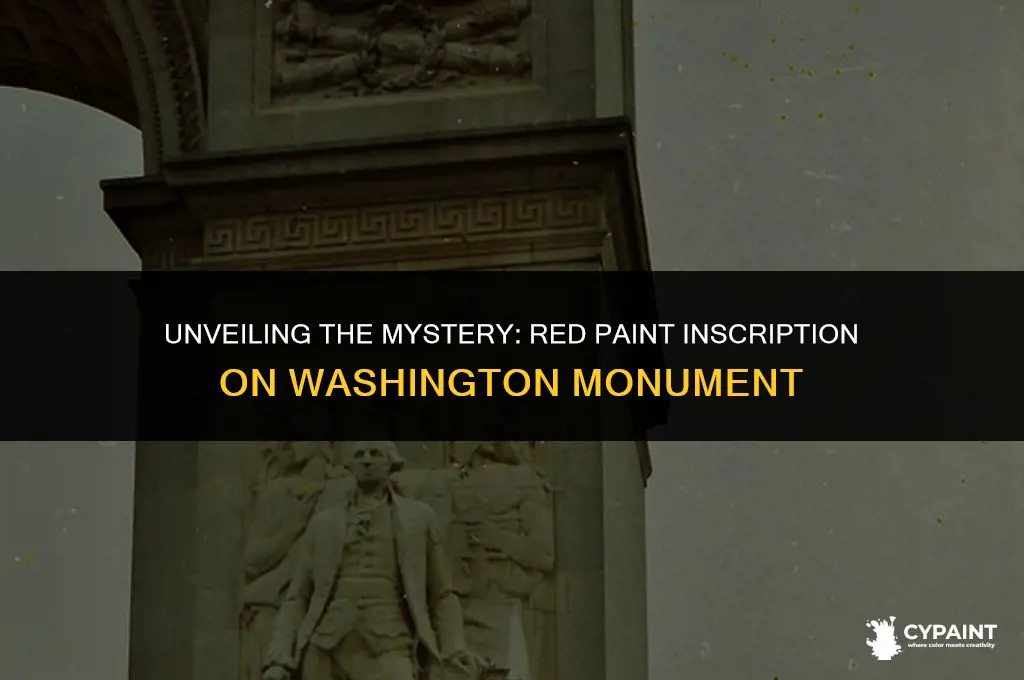 what was written on the washington monument in red paint