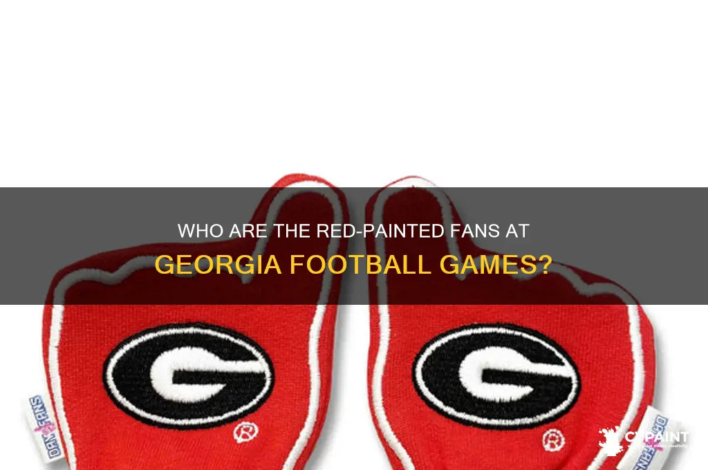 who are the guys painted red at ga game