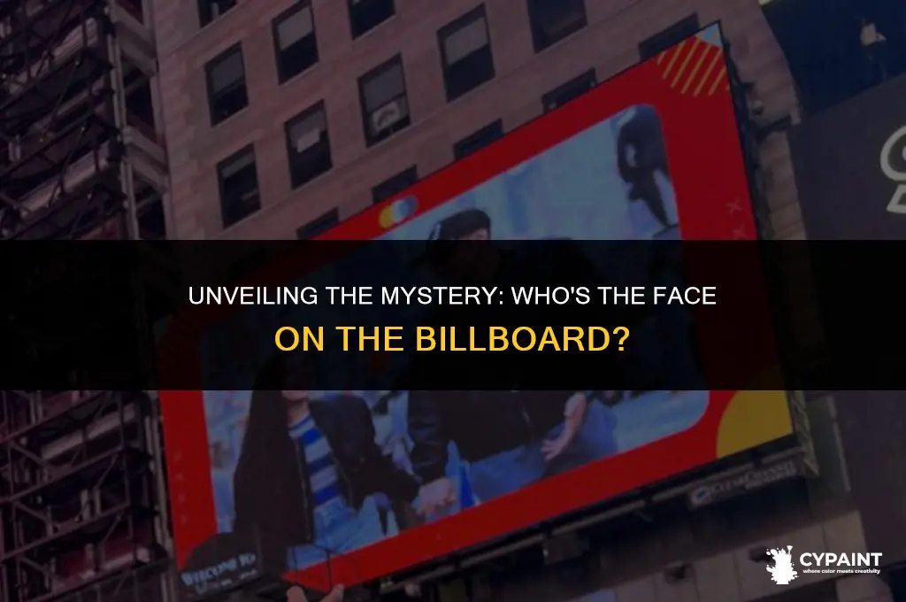 who is painted on a big board beside the road